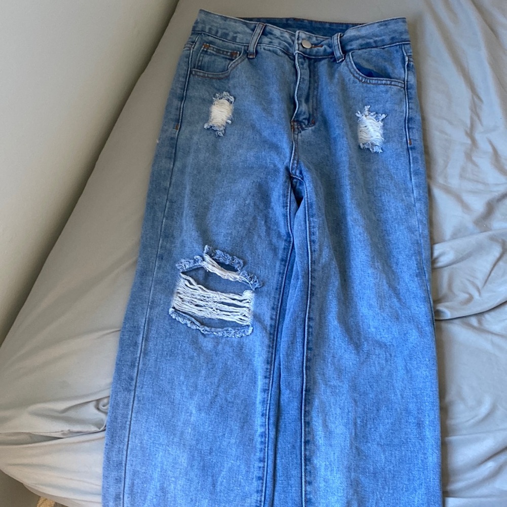 High waisted ripped mom jeans light washed